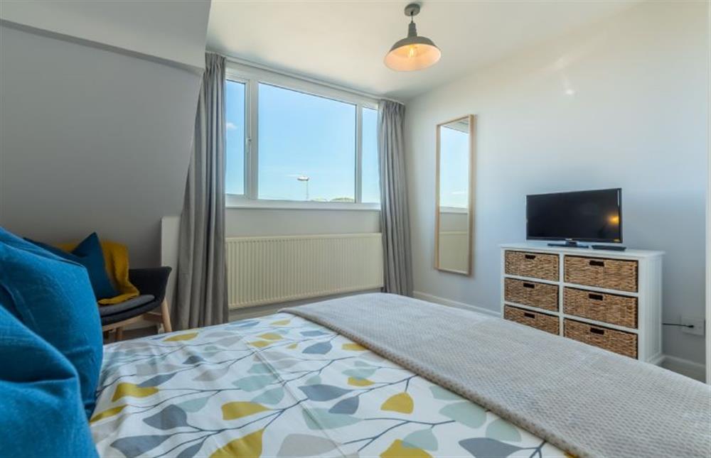 First floor: Master bedroom with television at High View, Wells-next-the-Sea