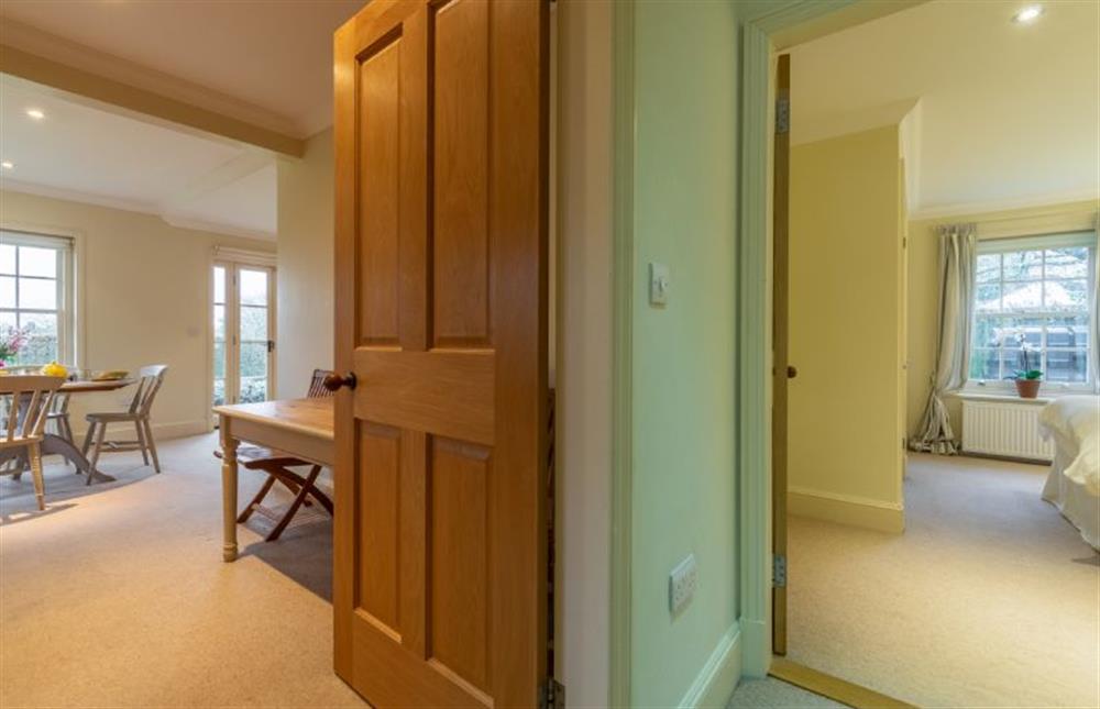 Hallway with views to bedroom and dining area at Higham Place Lodge, Higham