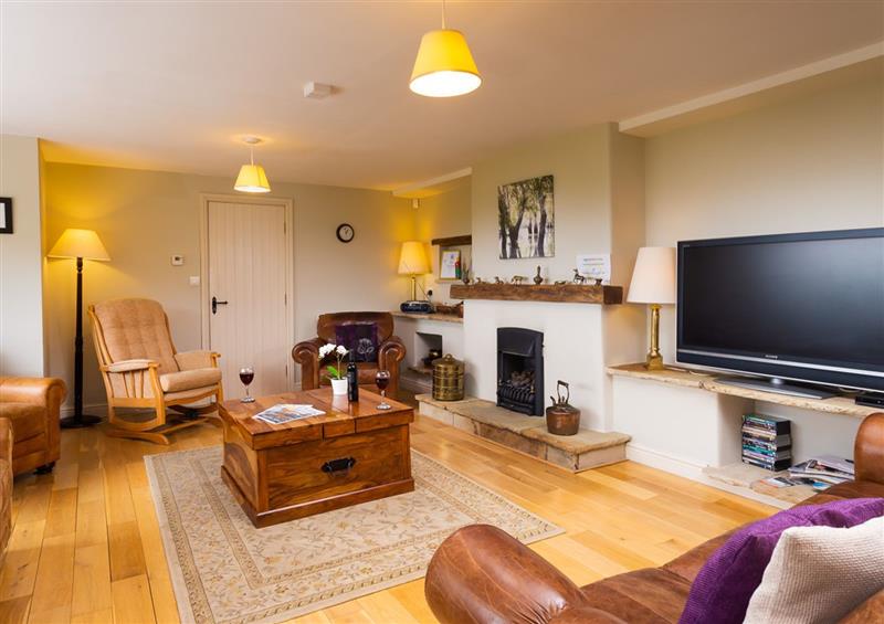 Relax in the living area at Highbeck, Bowness