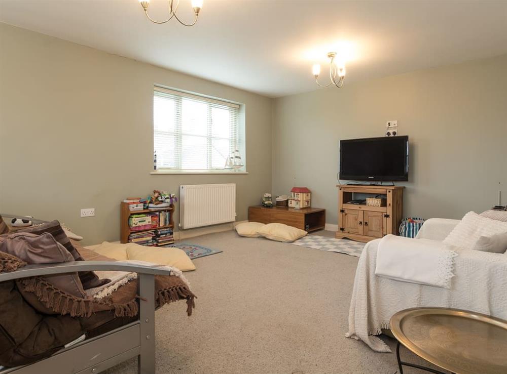 Sitting room with TV at Highbury Annexe in Frampton-on-Severn, near Stroud, Gloucestershire