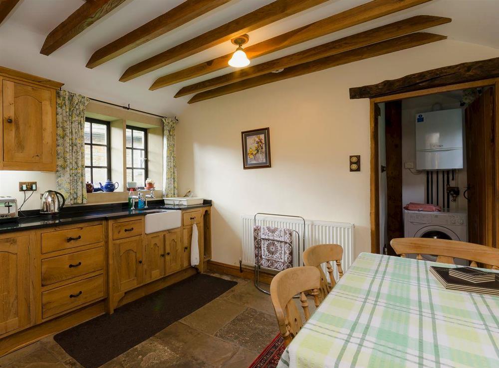 Country-style kitchen and dining area (photo 2) at Highbury Cottage in Hathersage, South Yorkshire