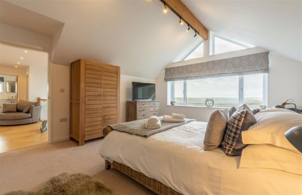 Bedroom one with a king-size bed with lovely views at Highcroft, St Minver