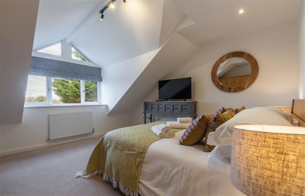 Bedroom two, a spacious room with a double bed at Highcroft, St Minver