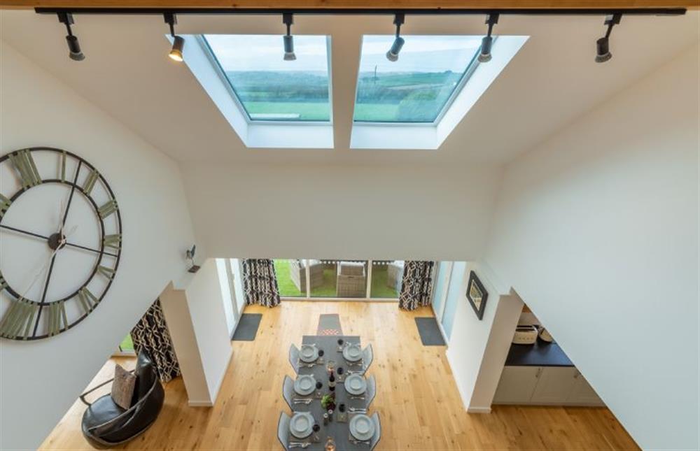 Looking down onto the open-plan dining area at Highcroft, St Minver