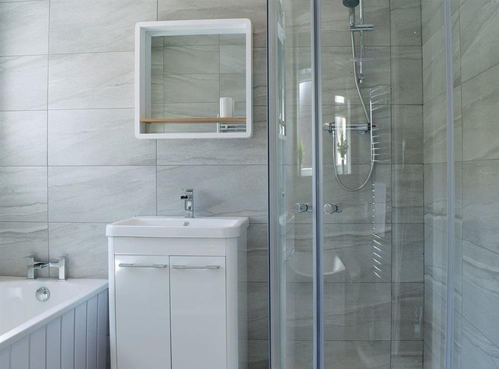 Bathroom with bath and shower cubicle at Highcross in Poulton-le-Fylde, near Blackpool, Lancashire