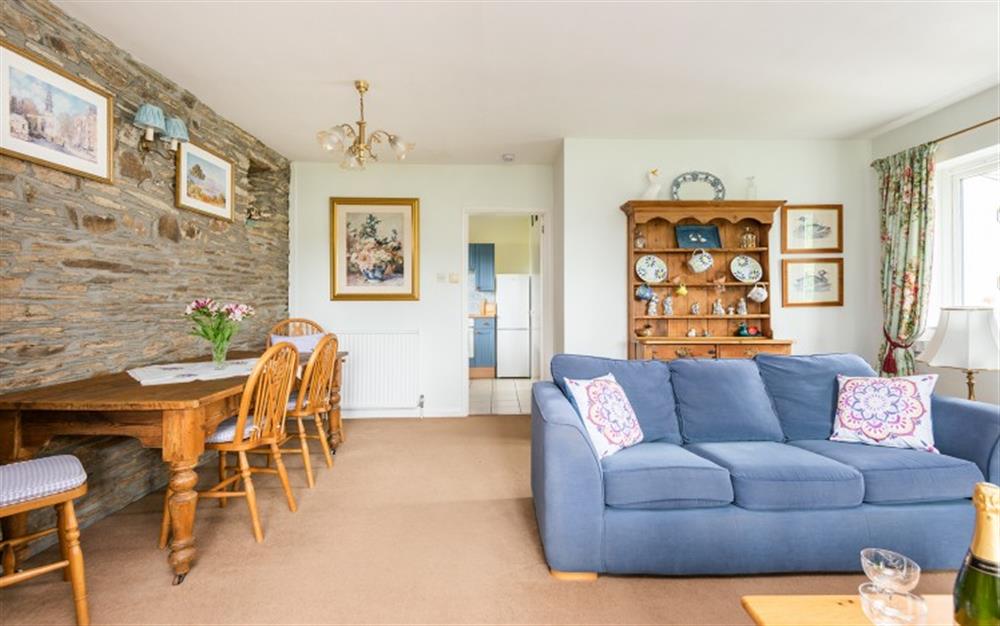 The lounge and dining area  at Higher Beneknowle Cottage in Diptford