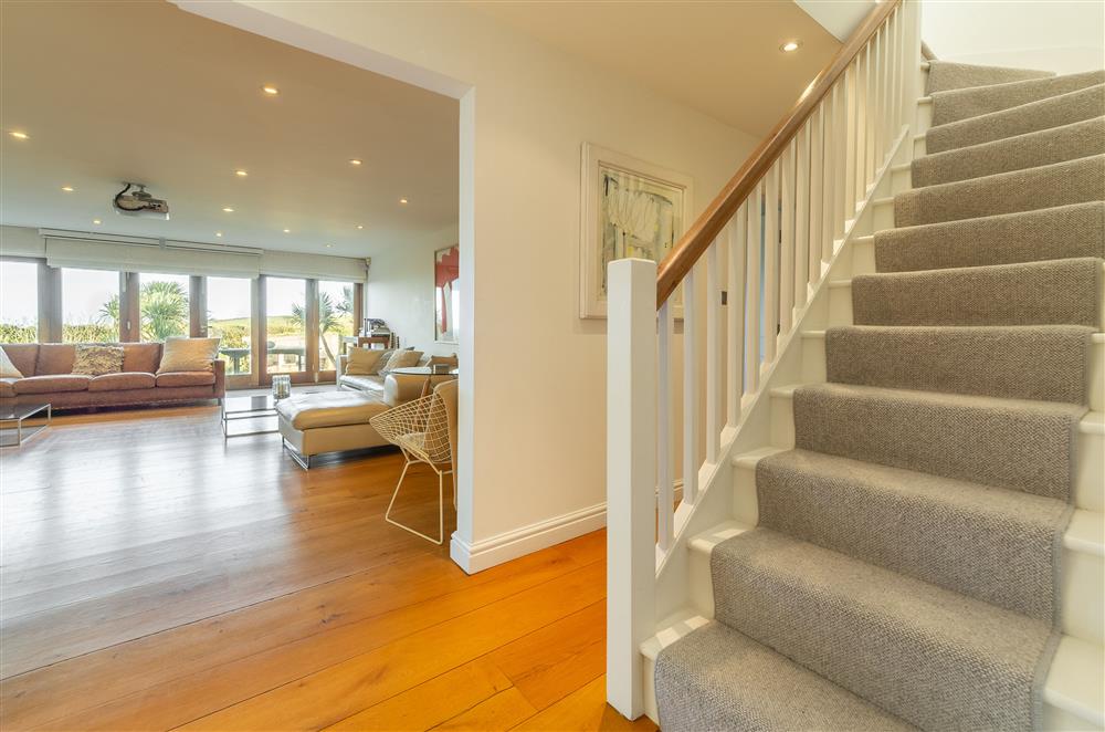 Hallway with stairs to first floor at Higher Close, Mawgan Porth