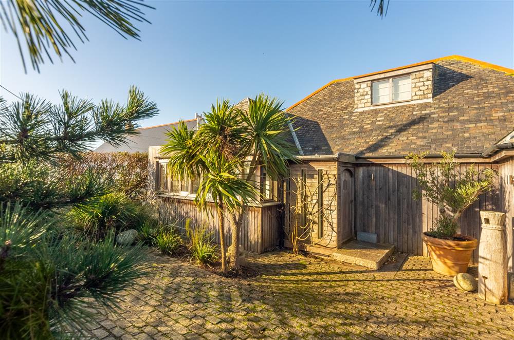 Higher Close is a stunning detached property set in its own beautiful grounds with views across the bay