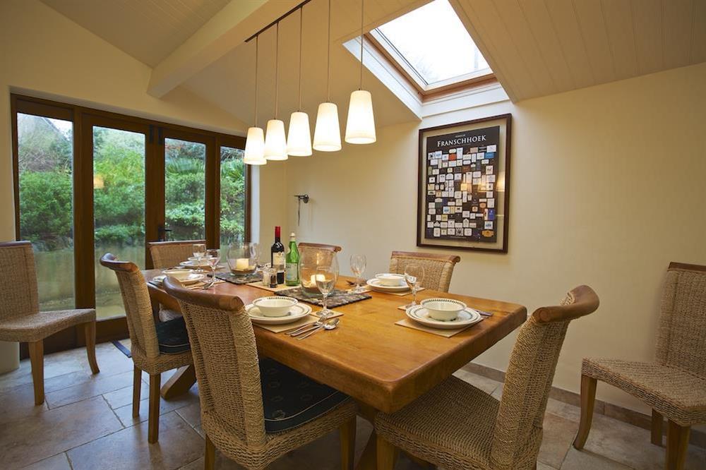 Dining room with ample space to seat between 6 and 8 people at Higher Collaton Cottage in Malborough, Nr Salcombe