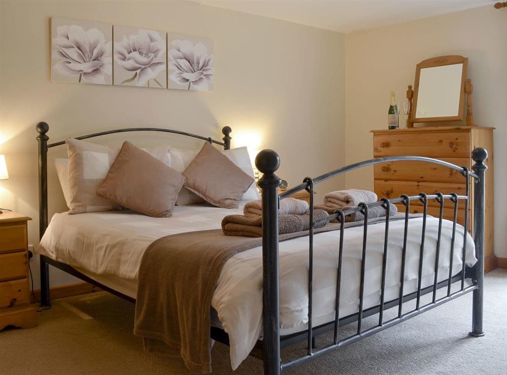 Attractive double bedroom at Higher Hopworthy Cottage, 
