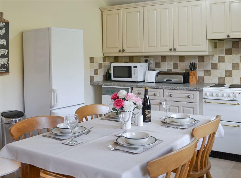 Charming kitchen/ dining room at Higher Hopworthy Cottage, 