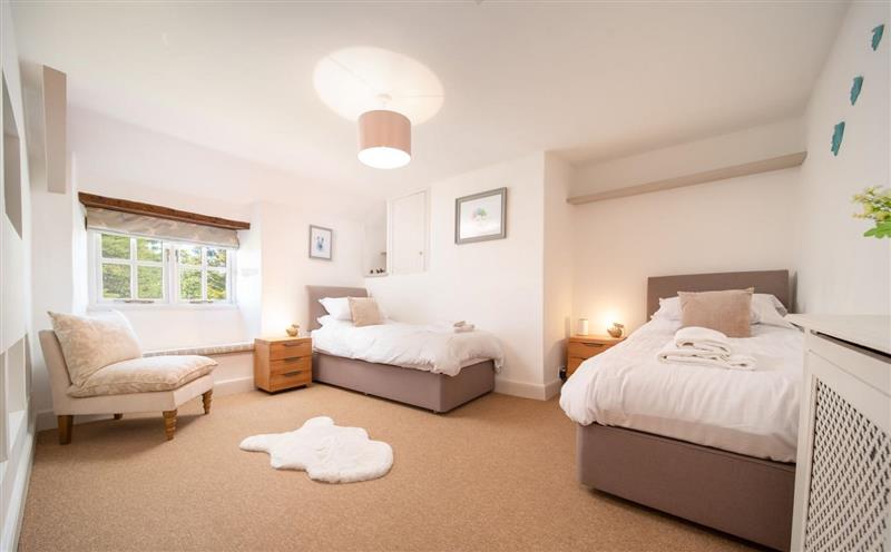 One of the 5 bedrooms at Higher Mullacott Farmhouse, Ilfracombe