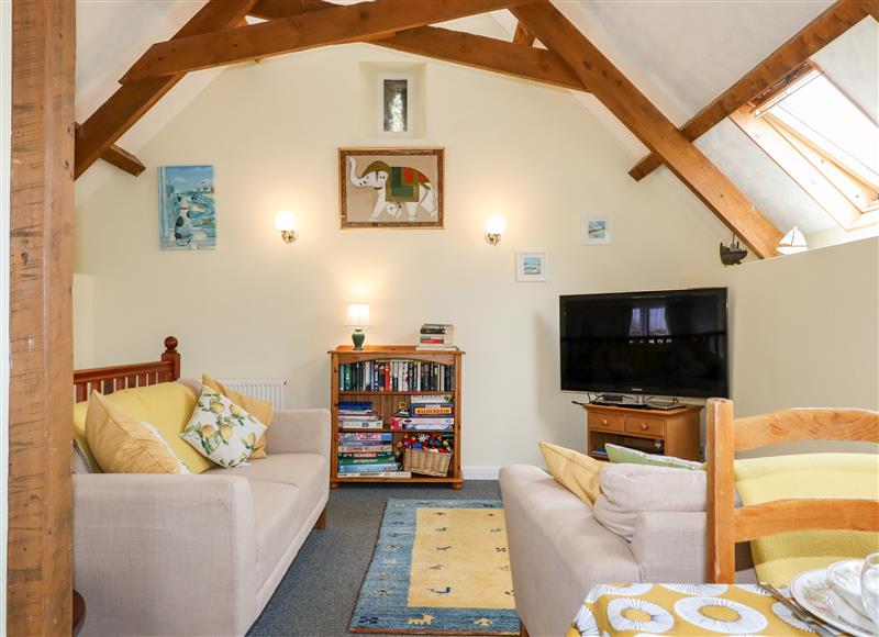 Relax in the living area at Higher Norton Barn, East Allington
