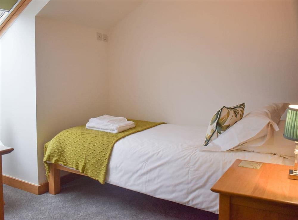 Inviting single bedroom at Wisteria House, 