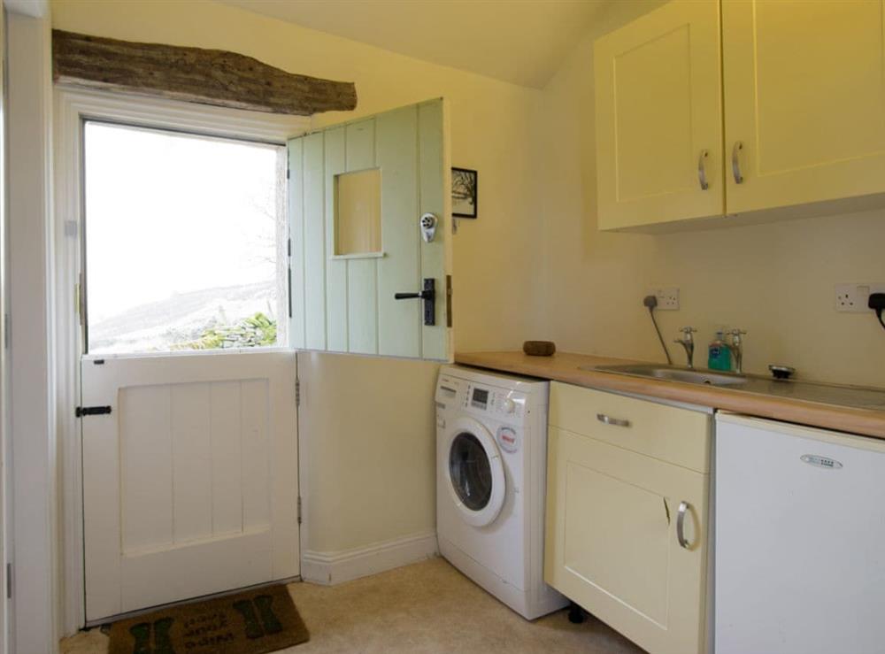Useful utility room and ground floor toilet adjoins kitchen at Higher Scarcliffe in Broughton, near Skipton, North Yorkshire