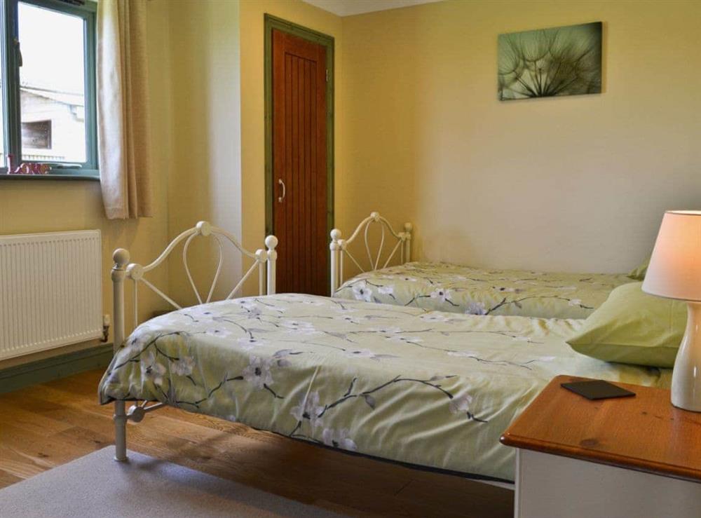 Twin bedroom at Bluebell Lodge, 