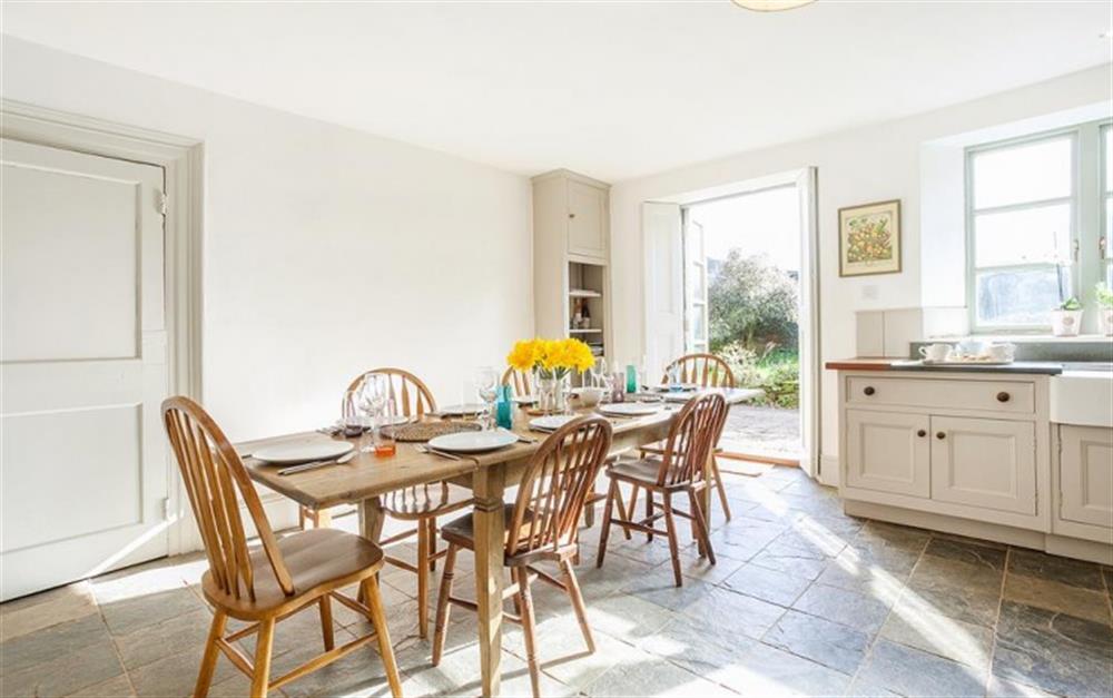 Dining area, with french windows to the garden. at Higher Sutton in Thurlestone