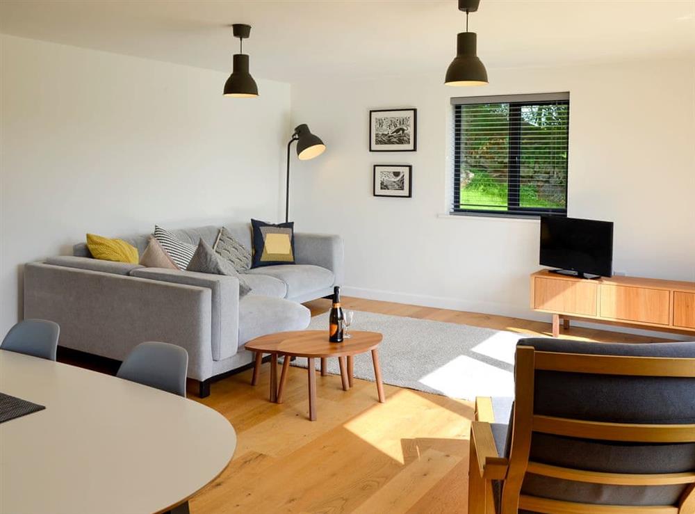Open plan living space with oak floor at The Perch, 
