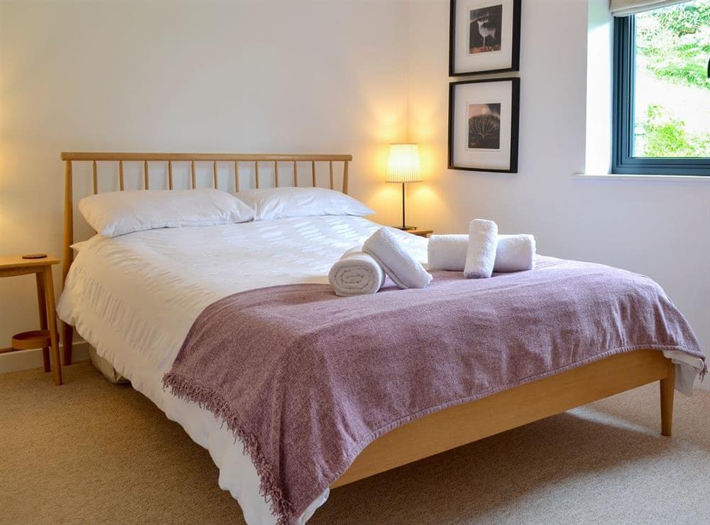 Tranquil bedroom with kingsize bed and en-suite at The Perch, 