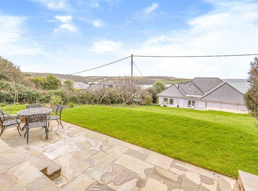 Large rear garden with patio area at Highlands in St Mawes, Cornwall