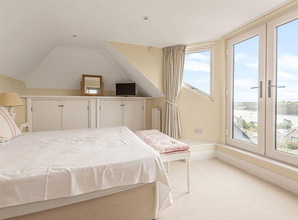 Master bedroom with superb water view at Highlands in St Mawes, Cornwall