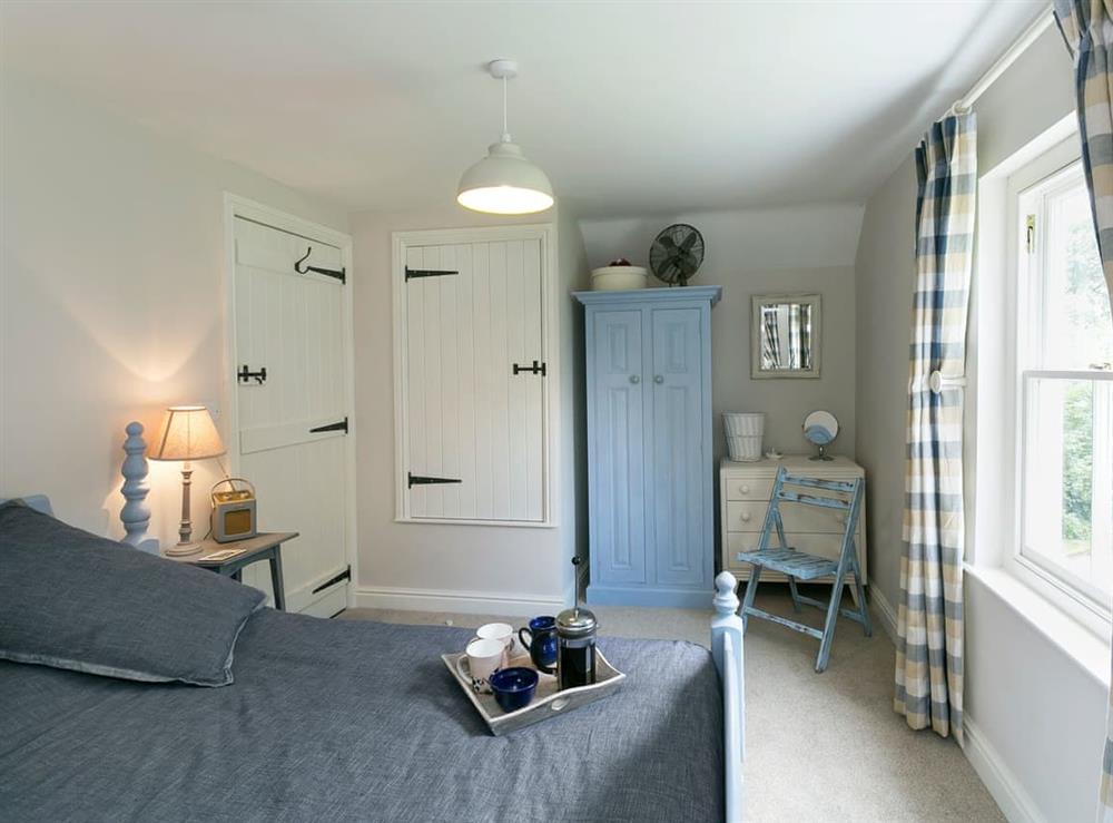 Elegantly decorated double bedroom at Hill Farm Cottage in Brinkhill, near Alford, Lincolnshire