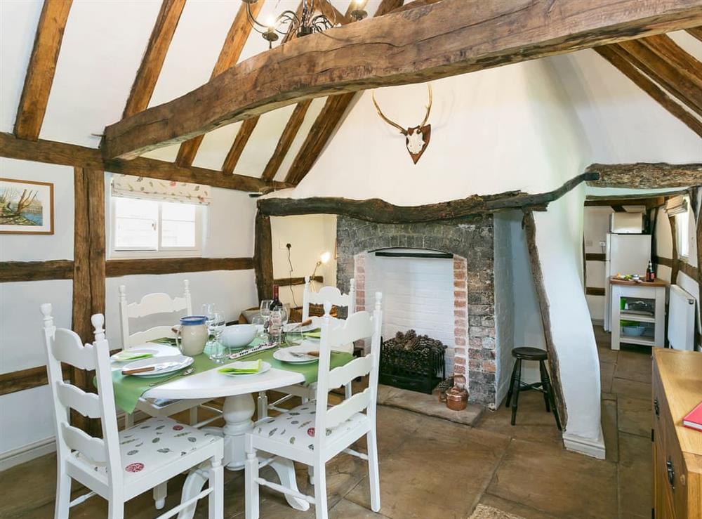 Rustic dining room with beams (photo 2) at Hill Farm Cottage in Brinkhill, near Alford, Lincolnshire