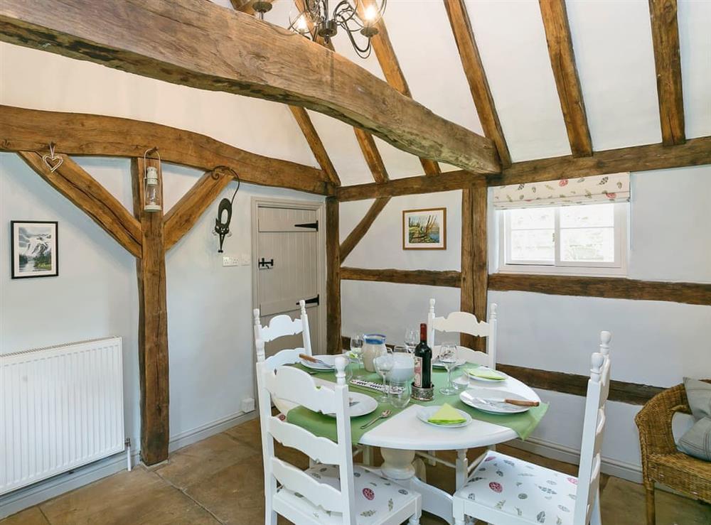 Rustic dining room with beams at Hill Farm Cottage in Brinkhill, near Alford, Lincolnshire