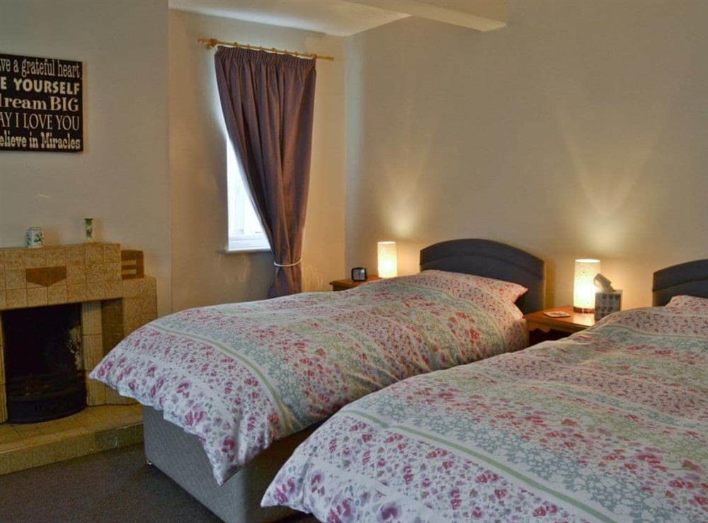 Twin bedroom with period features at Hill Farm in Harby, near Melton Mowbray, Leicestershire