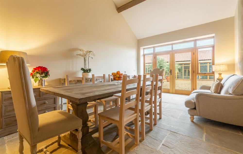 Open plan fully equipped kitchen, snug and dining area seating six guests (photo 2) at Hill Farm Massingham, Little Massingham