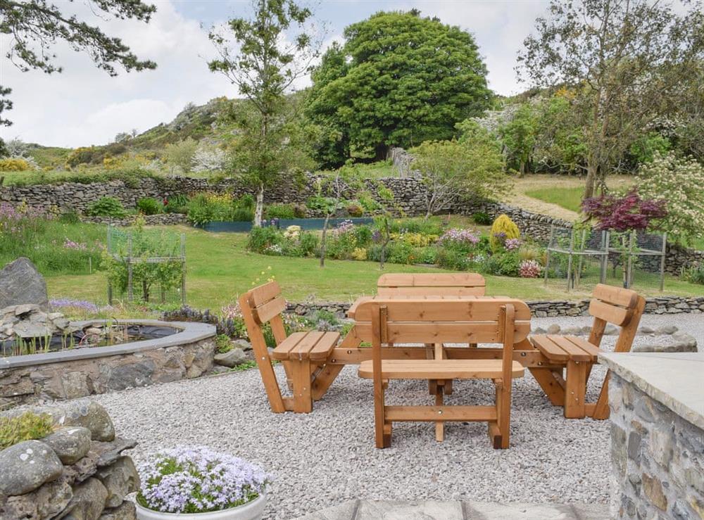 Gravelled patio with views over garden at Hill Top Barn in Newton-in-Cartmel, near Grange-over-Sands, Cumbria