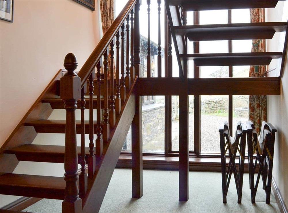 Open tread stairs to first floor at Hill Top Barn in Newton-in-Cartmel, near Grange-over-Sands, Cumbria