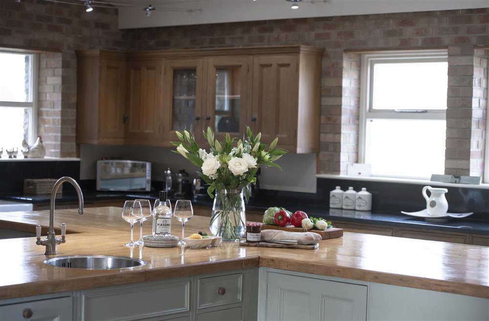 The delightful farmhouse kitchen is perfect for preparing meals for the whole family at Hill Top Farm, Askrigg, Nr Leyburn