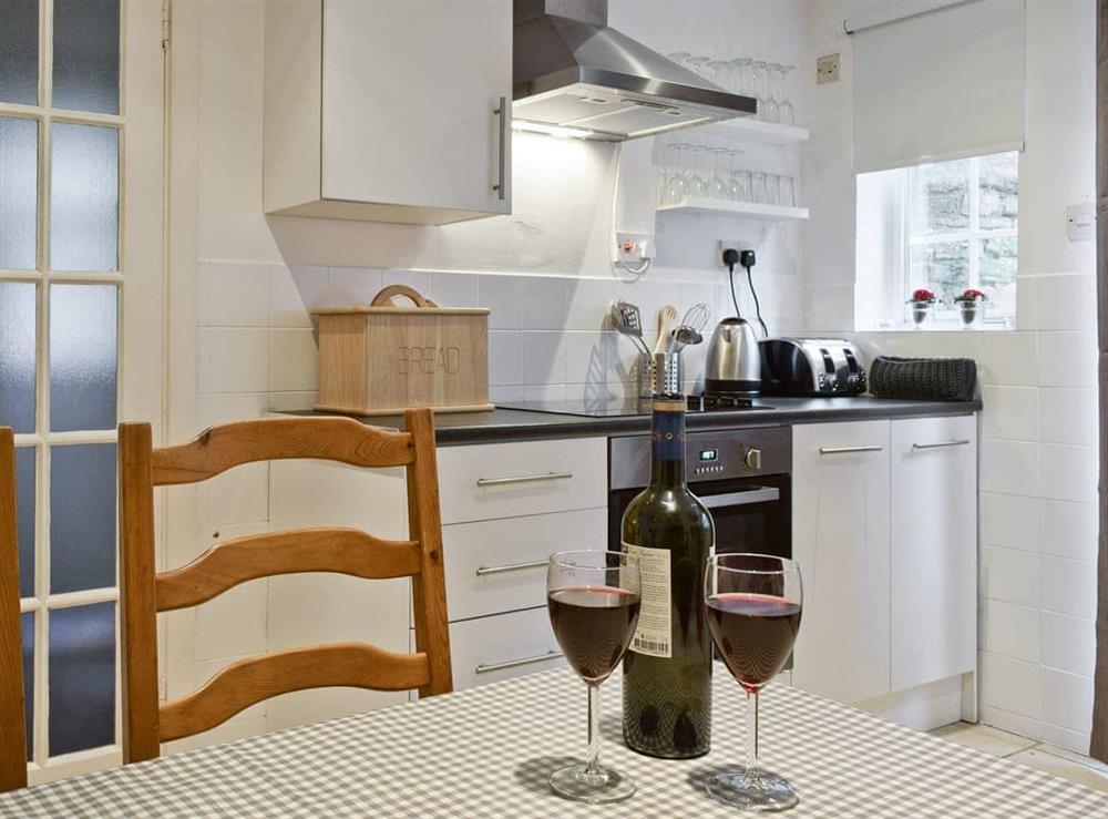 Stylish dining area in kitchen at Hill View Cottage in Snowshill, Worcestershire