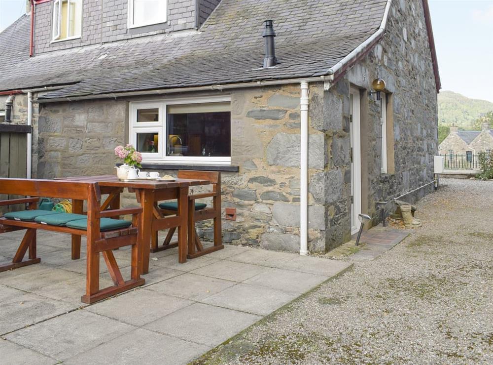 Paved patio area with outdoor furniture at Hill View House in Aberfeldy, Perthshire
