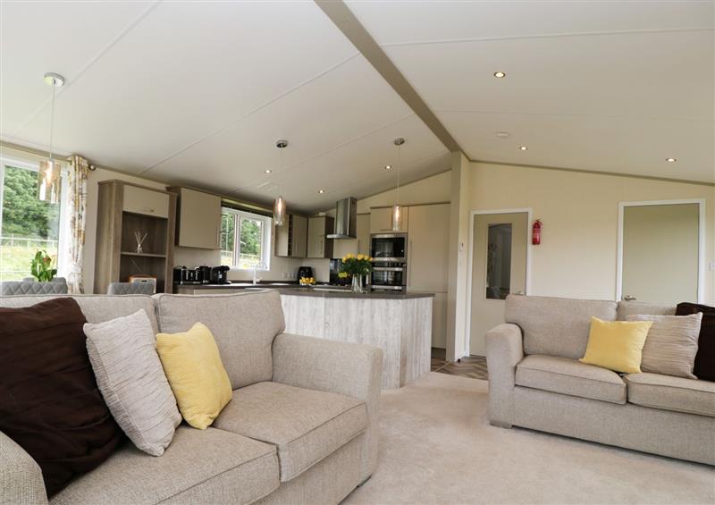 Relax in the living area at Hill View, Lilac Lodge, Wareham