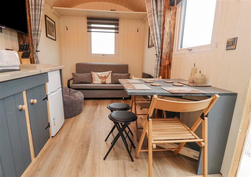 Relax in the living area at Hillcrest Shepherds Hut, Chipping