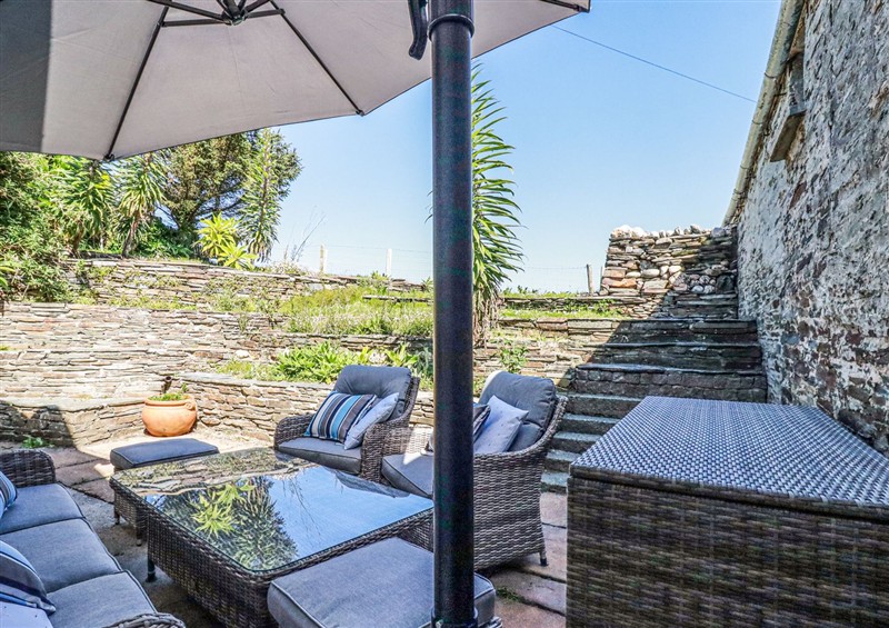 Enjoy a cup of tea on the patio at Hilldene, Treknow