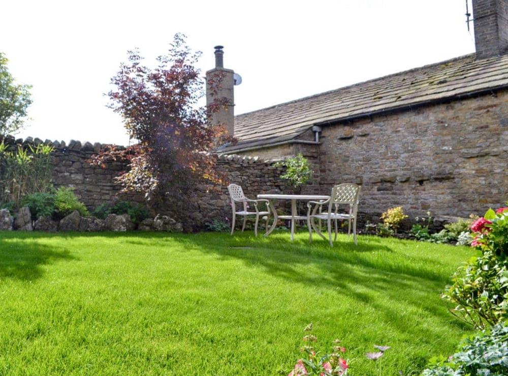 Garden with sitting area at Hillgarth in Askrigg, near Hawes, North Yorkshire