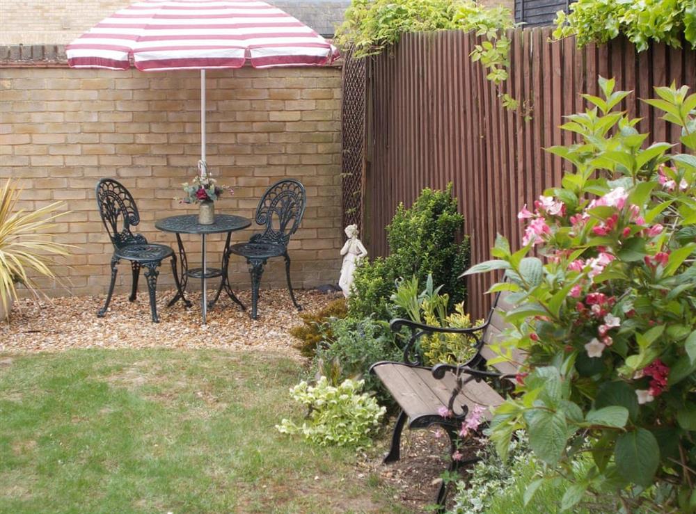 Garden area with outdoor furniture at Hillsbrook House in Sutton, near Ely, Cambridgeshire