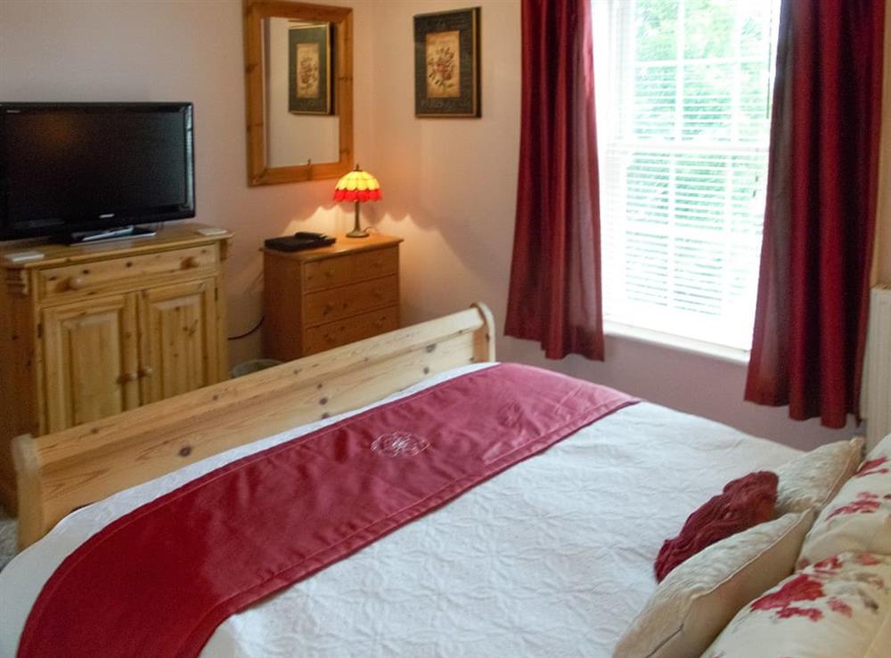 Peaceful bedroom with king sized bed at Hillsbrook House in Sutton, near Ely, Cambridgeshire