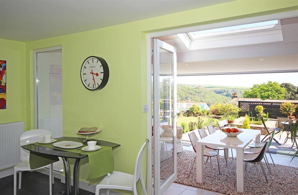 The kitchen opens into the conservatory at Hillsbrook in , Salcombe