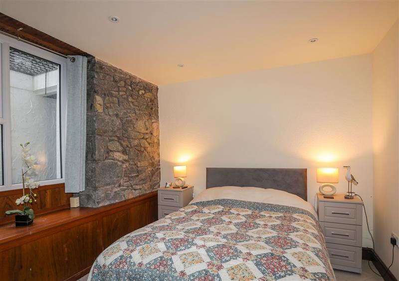 A bedroom in Hillside Apartment at Hillside Apartment, Pwllheli