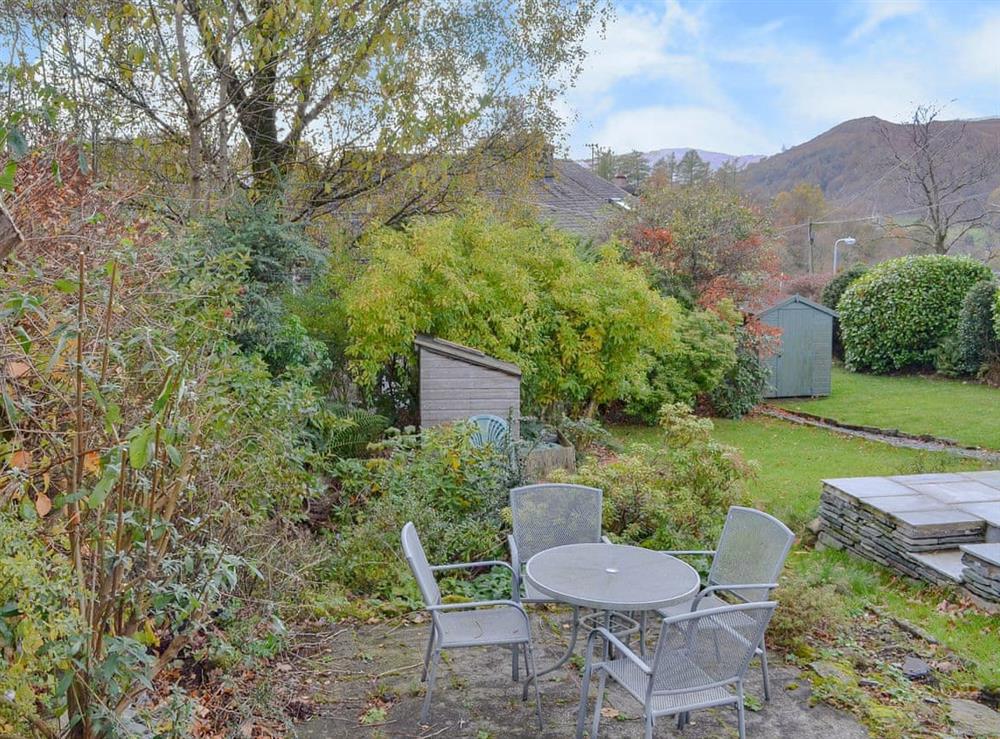Sitting out area in the attractive garden and grounds at Hillside Cottage in Ambleside, Cumbria