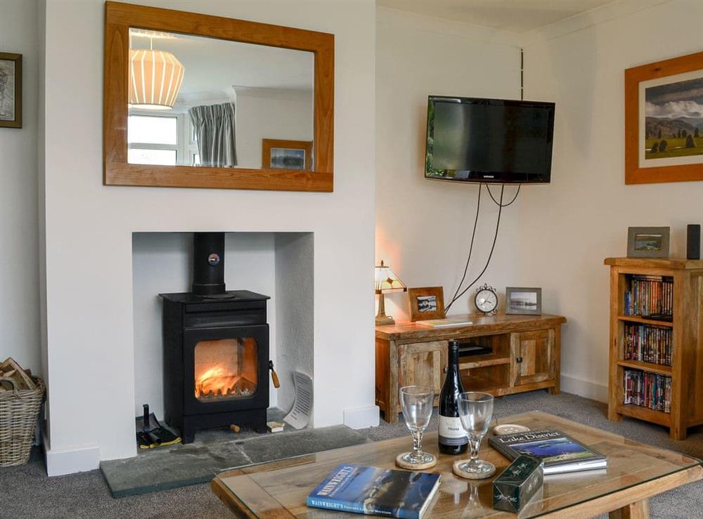 Delightful living room with wood burner at Hillside Cottage in Keswick, Cumbria