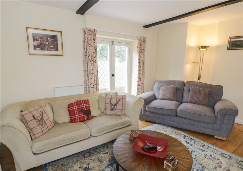 Relax in the living area (photo 2) at Hillside Cottage, near Monmouth