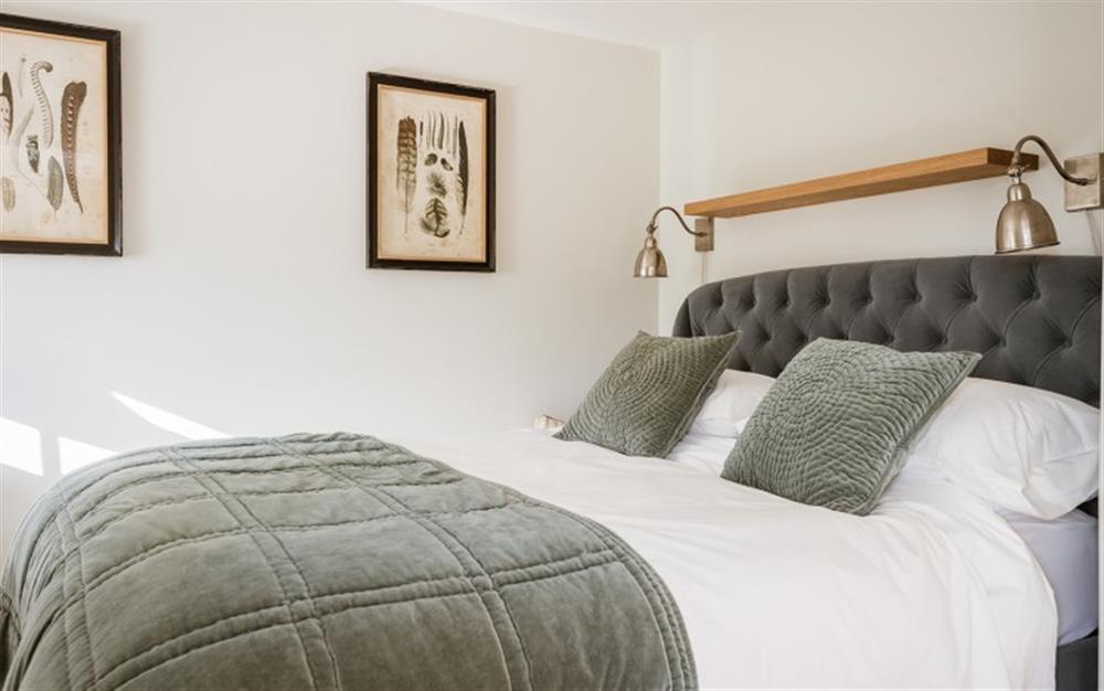 The comfortable and stylish bedroom  at Hillside Garden Studio in East Portlemouth