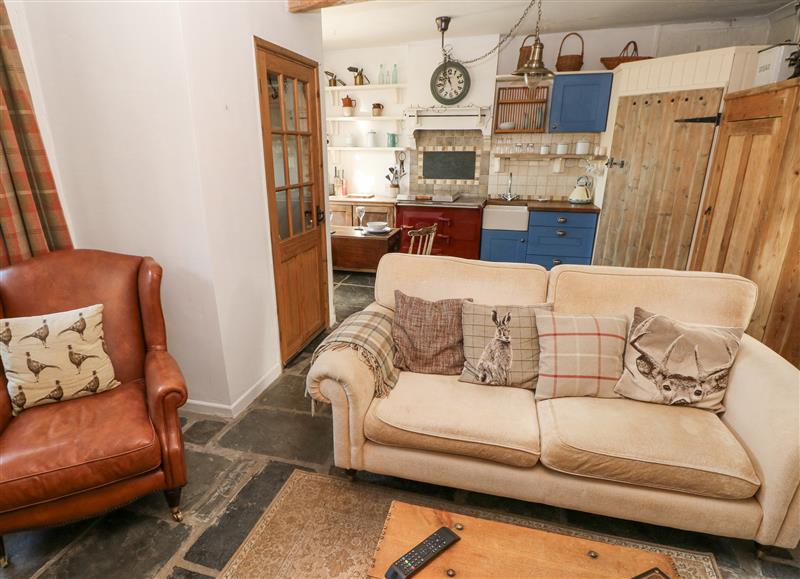 Relax in the living area at Hillside Holiday Cottage, Pentre