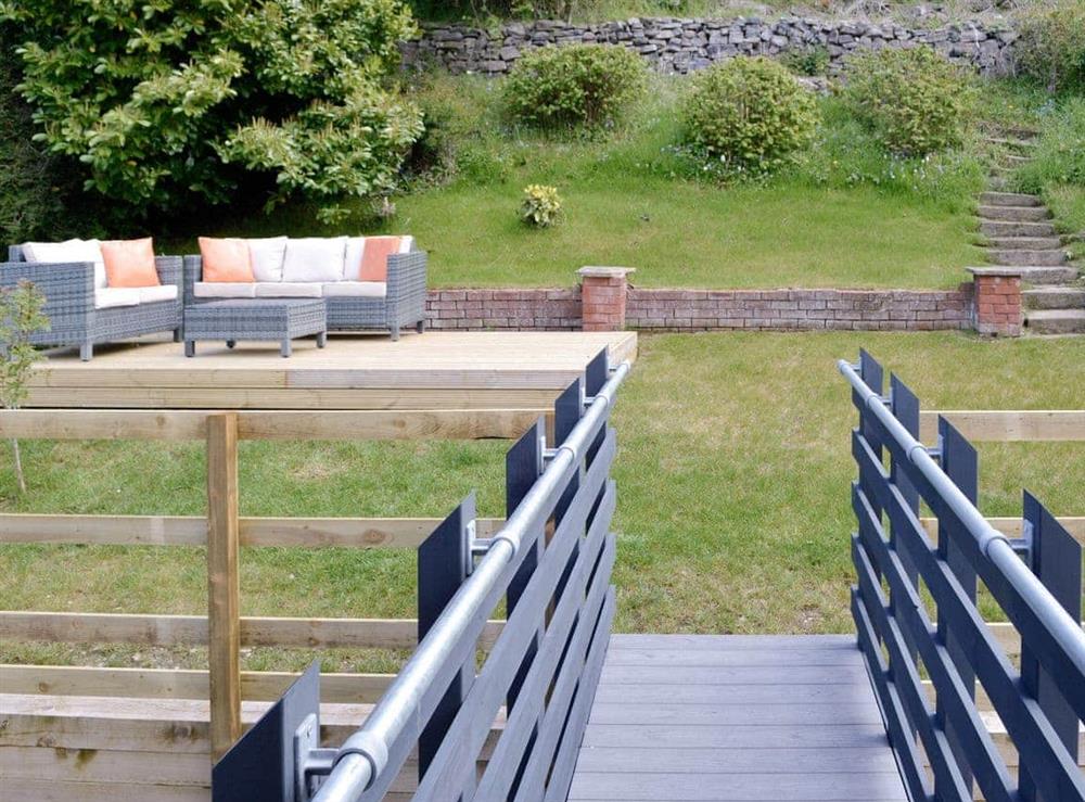 Bridge from living area to rear garden at Hillside Retreat in Prestatyn, Denbighshire