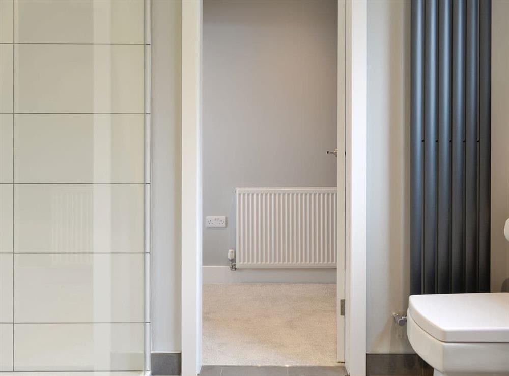 Shower room with heated towel rail at Hillside Retreat in Prestatyn, Denbighshire